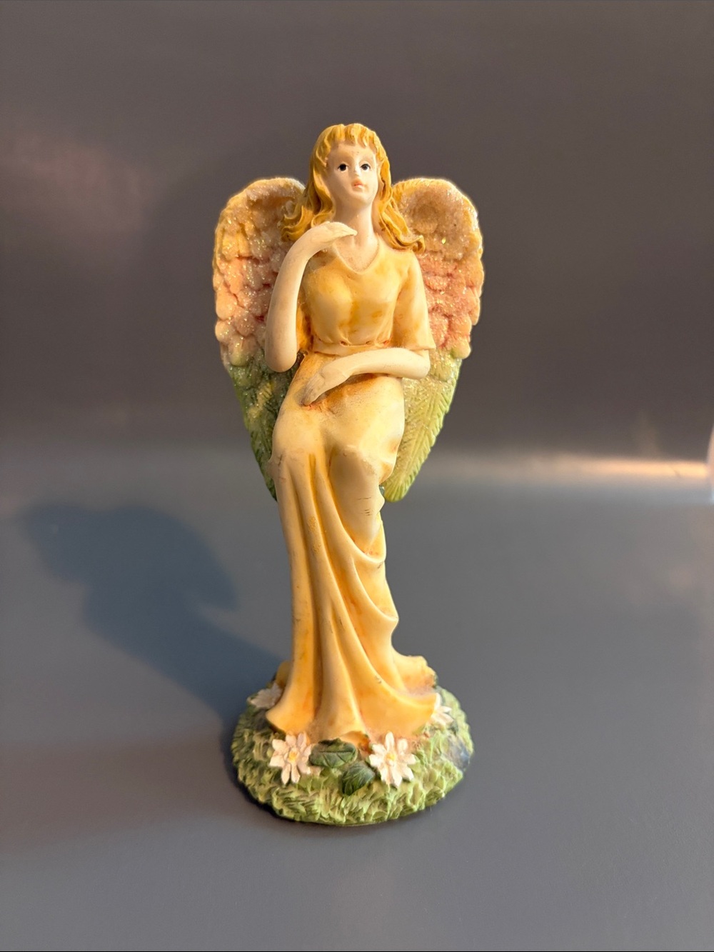 Yellow Angel Sculpture with Pink & Green Wings - Decorative Home Accent